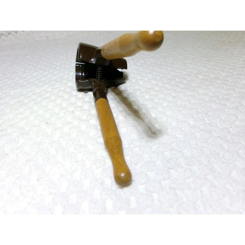 Vintage Spring Loaded Nutcracker‎ Brown Metal with Wood Handles Conical Design